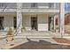 A lovely outdoor patio featuring a stone floor and planter boxes with a beautiful exterior at 1414 Biltmore Dr, Charlotte, NC 28207