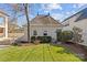 Charming garage with well-maintained landscaping and a beautifully manicured lawn at 1414 Biltmore Dr, Charlotte, NC 28207