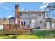 The rear exterior shows the wooden deck, chimney, and manicured lawn at 1417 Shady Bark Dr, Gastonia, NC 28054