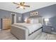 Comfortable main bedroom with a well-made bed, stylish furnishings, and calming decor at 1417 Shady Bark Dr, Gastonia, NC 28054