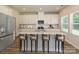 Modern kitchen with white cabinets, stainless steel appliances, granite countertops, and a large island at 146 Aberdeen Dr, Salisbury, NC 28144