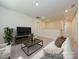 Cozy living room with neutral carpet, couch, coffee table, TV, and a loft feel at 146 Aberdeen Dr, Salisbury, NC 28144