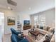 Comfortable living room with large windows, sofas, and a television on a wooden stand at 146 Aberdeen Dr, Salisbury, NC 28144