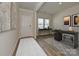 Bright home office with two workstations, a white door, and natural light at 146 Aberdeen Dr, Salisbury, NC 28144