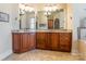 Luxurious bathroom boasts double sinks, granite countertops, and custom cabinetry at 2036 Rocky Stream Rd, York, SC 29745