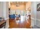 Bright and airy living room featuring high ceilings, hardwood floors, and large windows at 2036 Rocky Stream Rd, York, SC 29745