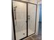 Modern glass-enclosed shower with marble tiling and matte black hardware at 2057 Fordhill St, Rock Hill, SC 29732