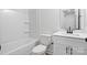 Clean bathroom with shower-tub combo, and modern vanity at 211 E Rice St, Landis, NC 28088