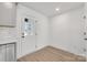 Bright modern kitchen area showing new appliance, countertop, and flooring at 211 E Rice St, Landis, NC 28088