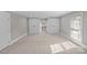 Bright bedroom with ample closet space and a large window that makes this space inviting at 220 W Bell St, Statesville, NC 28677