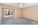 Bright bedroom with ceiling fan and large window offering exterior views to enhance the home at 2324 Brookview Ct, Rock Hill, SC 29732