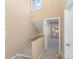 Hallway with carpeted floors leads to a sunlit room, enhancing the home's appeal at 2324 Brookview Ct, Rock Hill, SC 29732