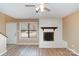 Inviting living room featuring a decorative fireplace and ample natural light at 2324 Brookview Ct, Rock Hill, SC 29732