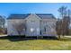 Rear view of a two-story home with a spacious wooden deck and a backyard at 280 Bonaventure Dr, Salisbury, NC 28147