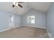 Bedroom featuring neutral carpet, a window for natural light, and an attached bathroom at 280 Bonaventure Dr, Salisbury, NC 28147