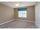 Neutral bedroom with a ceiling fan and window with blinds allowing in natural light at 280 Bonaventure Dr, Salisbury, NC 28147