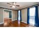 Bright bedroom with hardwood floors, two windows, and an inviting ambiance at 280 Bonaventure Dr, Salisbury, NC 28147