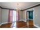 Inviting dining room with hardwood floors and abundant light from large window at 280 Bonaventure Dr, Salisbury, NC 28147