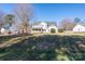 Landscaped front yard with a view of the two-story home at 280 Bonaventure Dr, Salisbury, NC 28147