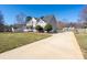 Well-maintained two-story home with attached garage and long driveway at 280 Bonaventure Dr, Salisbury, NC 28147