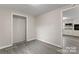 Bedroom with neutral walls, grey flooring, and a closet at 2909 Glendale Ave, Kannapolis, NC 28081