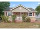 Charming single-story home with a cozy front porch and well-maintained landscaping at 2909 Glendale Ave, Kannapolis, NC 28081