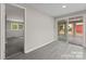 View of living room with light-colored walls and access to a sunroom at 2909 Glendale Ave, Kannapolis, NC 28081