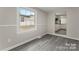 Bright living room with wainscoting and view to the kitchen at 2909 Glendale Ave, Kannapolis, NC 28081