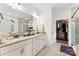 Bathroom features double vanity with granite countertop and a walk-in closet at 2929 Shumard Dr, Gastonia, NC 28054