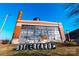 Low angle of a brick building with a smokestack, industrial windows and the name 'BOILER YARD' at 3018 Casting St # 20, Charlotte, NC 28206