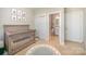 Neutral-toned Bedroom featuring a crib, closet, and an ensuite bathroom, perfect for a growing Gathering at 3621 Vallette Ct, Charlotte, NC 28203