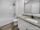 Bright bathroom featuring granite countertop, modern fixtures, and a tub and shower at 3792 Rolling View Ln, Maiden, NC 28650