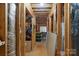 Spacious unfinished attic features exposed beams and potential for storage or customization at 409 Conaway Ct, Waxhaw, NC 28173