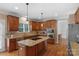 Beautiful kitchen featuring an island, granite countertops and stainless steel appliances at 409 Conaway Ct, Waxhaw, NC 28173