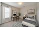 Cozy bedroom featuring a study nook, neutral tones and comfortable furniture at 4226 Cornelia Ln, Rock Hill, SC 29732