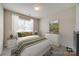 Serene bedroom with neutral tones, a comfortable bed, and a decorative dresser at 4226 Cornelia Ln, Rock Hill, SC 29732