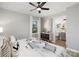 Serene bedroom with a modern accent cabinet and an ensuite bathroom for added convenience and privacy at 4308 Welling Ave, Charlotte, NC 28208