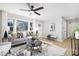 Cozy living room with a large window, comfortable seating, and contemporary decor at 4308 Welling Ave, Charlotte, NC 28208