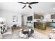 Open-concept living room flows into a stylish kitchen, creating a welcoming and modern living space at 4308 Welling Ave, Charlotte, NC 28208