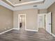 Spacious main bedroom with doorways leading to the bathroom and walk-in closet at 6420 Cambridge Dr, Harrisburg, NC 28075