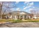 Community clubhouse featuring manicured landscaping on a sunny day at 9562 Littleleaf Dr, Charlotte, NC 28215