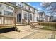 Multi-level wooden deck with stairs offers access to the backyard and home at 1017 Anduin Falls Dr, Charlotte, NC 28269