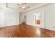 Large bedroom with hardwood floors, ensuite bathroom and walk-in closets at 1017 Anduin Falls Dr, Charlotte, NC 28269