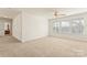 Spacious room with large windows offering natural light and a ceiling fan at 1017 Anduin Falls Dr, Charlotte, NC 28269