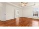 Bright bedroom with hardwood floors and ensuite bathroom at 1017 Anduin Falls Dr, Charlotte, NC 28269