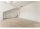 Spacious bonus room with adjacent staircase at 1017 Anduin Falls Dr, Charlotte, NC 28269