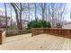 Large wooden deck offers great outdoor space and a view of the backyard at 1017 Anduin Falls Dr, Charlotte, NC 28269