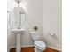 Cozy powder room with pedestal sink at 1017 Anduin Falls Dr, Charlotte, NC 28269