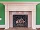 Elegant fireplace with marble surround and classic mantel design at 1030 Bolling Rd, Charlotte, NC 28207