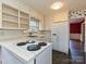 Bright and functional kitchen featuring a double sink, updated appliances, and abundant counter space at 1030 Bolling Rd, Charlotte, NC 28207